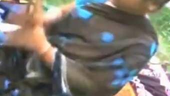Mature Indian Woman Fondling And Teasing Young Boy'S Genitals