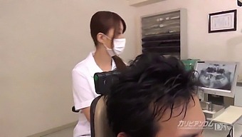Natural Japanese Tits On Display In Dentist-Themed Video