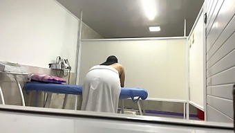 A Mature Patient With A Big Ass Gets Oiled Up In A Medical Office
